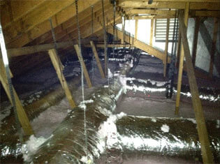 After image of new, properly installed ductwork in an attic.