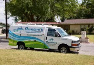 Damiani's HVAC service truck parked outside a home.