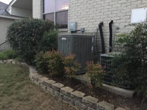 ac unit next to house