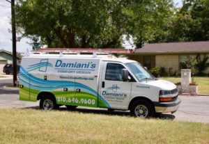 Damiani's HVAC service truck parked outside a home on a sunny day.