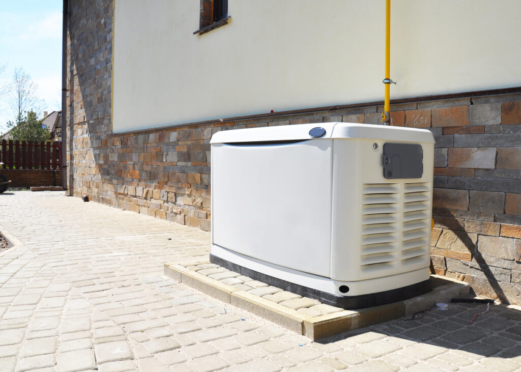 Whole-home generator outside of a house.