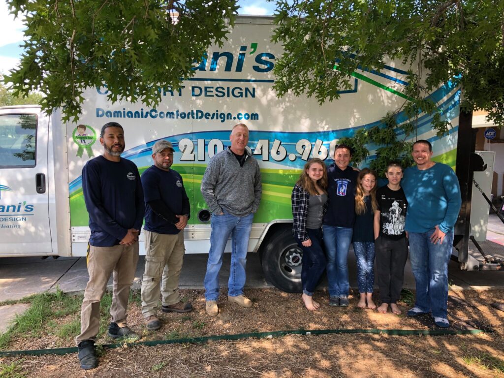 Damiani's HVAC team standing in front of their truck